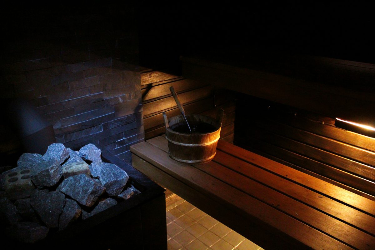 Sauna with rocks, bucket and ladle